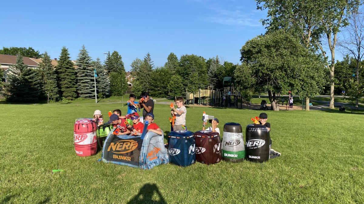 Group of kids celebrating at their battle party