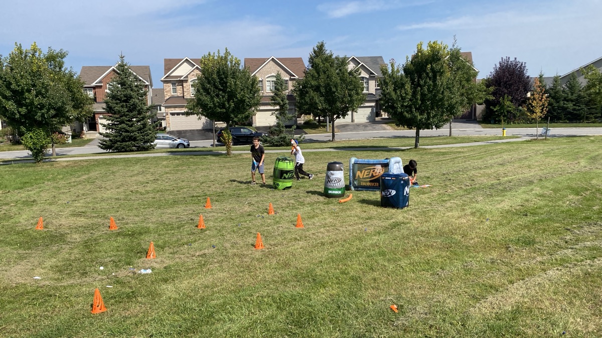 Field being set up with boundary cones and barricades